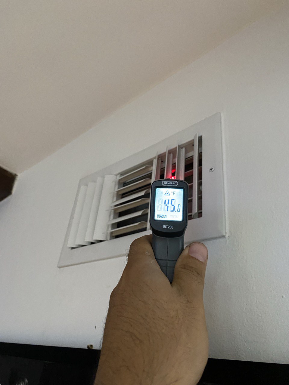 Checking central AC temperature